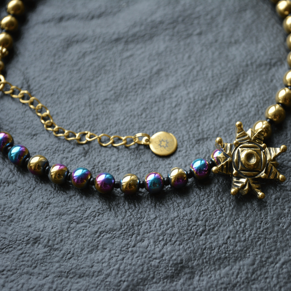 Necklace of halves of gold and rainbow hematite with star, Gold