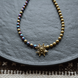 Necklace of halves of gold and rainbow hematite with star, Gold