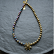 Necklace of halves of gold and rainbow hematite with star, Gold