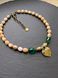 Dukach yahnusok with green crystals and mother-of-pearl beads